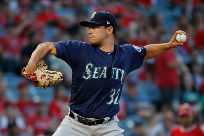 Seattle Mariners pitcher Marco Gonzales retired his first 10 batters, gave up just two hits and struck out four without issuing a walk in seven innings Wednesday. [AP Photo/Jae Hong]