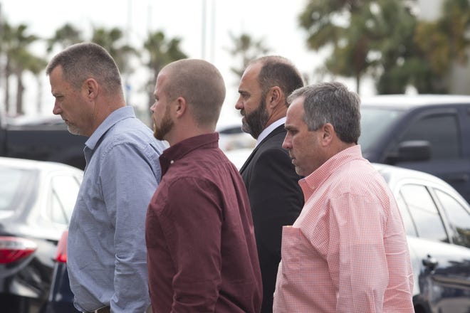 Former Major Michael Baxter, 49, second from right, appears for the first day of his trial at the Panama City federal courthouse in January. [JOSHUA BOUCHER/THE NEWS HERALD]
