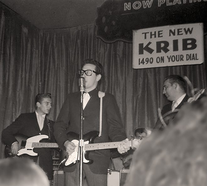 From left, Waylon Jennings, Buddy Holly, and Tommy Allsup perform on Feb. 2, 1959, at the Surf Ballroom in Clear Lake, Iowa. The photo is part of the "Buddy Holly: Life, Legend, Legacy" exhbit on display at the Southwest Collection/Special Collections Library exhibit at Texas Tech. [Photo taken by Mary Gerber, owned and provided by Sevan Garabedian & James McCool]