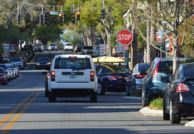 Cars line Donnelly Street on Monday, March 5, 2018, in downtown Mount Dora. [Whitney Lehnecker/Daily Commercial]