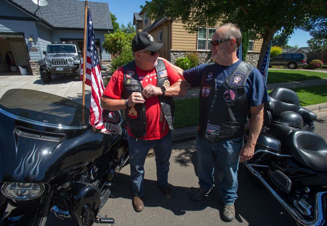 Roger Cox (left) and Bill Filley are captains of this year's Tribute to Fallen Soldiers NW Memorial Torch Motorcycle Ride. [Brian Davies/The Register-Guard] - registerguard.com