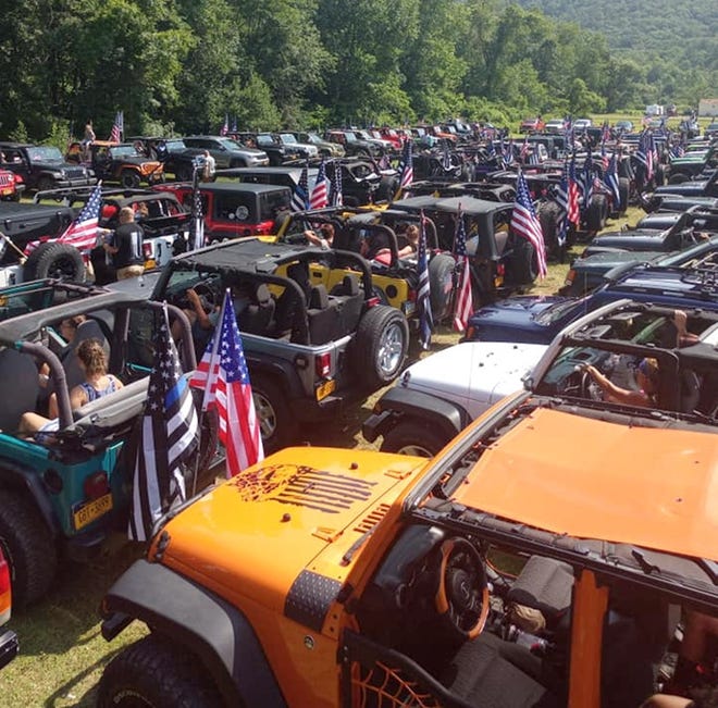 Hundreds of Jeeps and trucks were staged at the County Pub 2 prior to Sunday's ride. [PHOTO COURTESY OF BLUE LIVES MATTER TWIN TIERS]