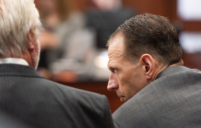 James Terry Colley, right, listens to his attorney Garry Wood during his trial held in the St. Johns County courthouse on Monday. Colley is facing two counts of first-degree murder in the 2015 shooting deaths of 36-year-old Amanda Cloaninger Colley and her friend, 39-year-old Lindy Mosler Dobbins. [PETER WILLOTT/THE RECORD]