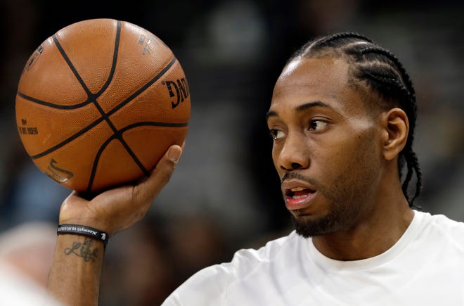 Kawhi Leonard, the 2014 NBA Finals MVP, averaged 19.7 points per game for the San Antonio Spurs over seven seasons, although injuries limited him to nine games this past season. [AP Photo/Eric Gay]