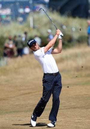 Justin Thomas plays a shot on the second hole during a practice round Wednesday for the British Open in Carnoustie, Scotland, which begins today. [Peter Morrison/The Associated Press]
