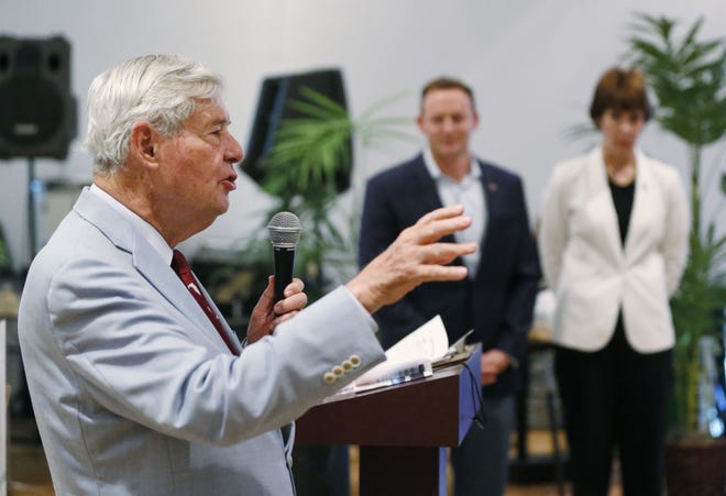 Former Florida Gov. and U.S. Sen. Bob Graham, foreground, speaks during an event for his daughter, former Democratic gubernatorial candidate and former U.S. Rep. Gwen Graham, rear right, on June 7 in Pembroke Pines. [AP Photo/Wilfredo Lee, File]