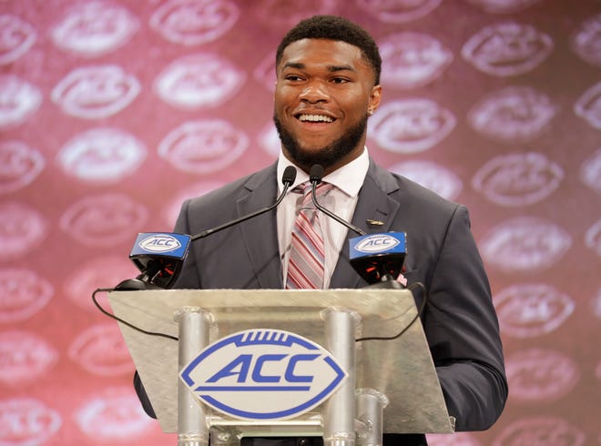 Florida State's Cam Akers answers a question during a news conference at the NCAA Atlantic Coast Conference college football media day in Charlotte, N.C., Thursday, July 19, 2018. (AP Photo/Chuck Burton)