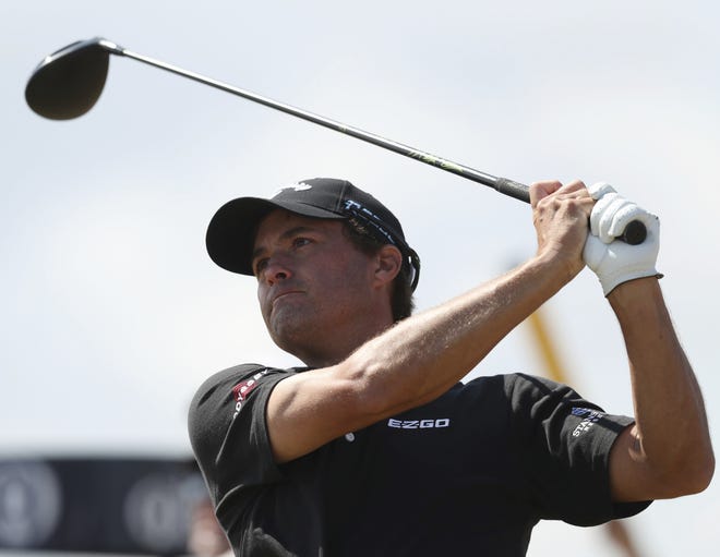 Kevin Kisner of the US plays off the 18th tee during the first round of the British Open Golf Championship in Carnoustie, Scotland, on Thursday. [Jon Super/AP]