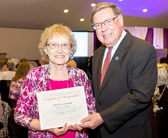 Senator James Seward awards a certificate to Herkimer County honoree Barb Curran of Newport as part of the New York State Office for the Aging 2018 Older New Yorkers’ Day celebration in Albany.   

[Photo Submitted]