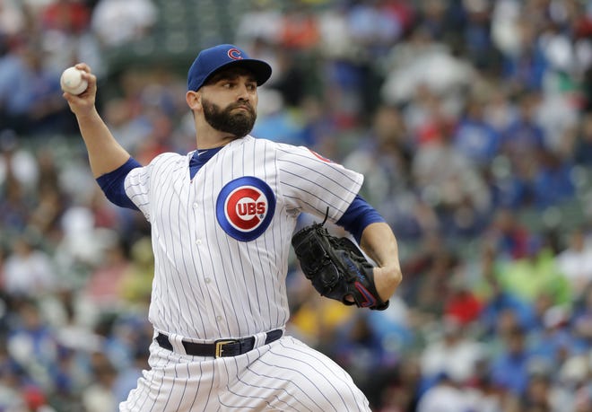 Chicago Cubs starting pitcher Tyler Chatwood delivers during the first inning of a baseball game against the Chicago Cubs Saturday, July 21, 2018, in Chicago. (AP Photo/Charles Rex Arbogast)