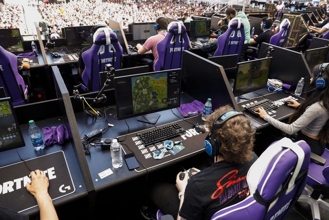 Gaming has become so prevelant in society that the recent Battle Royale Celebrity Pro Am in Los Angeles drew huge crowds. It's also got officials from pro sports teams worried about how gaming affects the fitness levels of athletes, especially when it comes to lack of sleep. [Bloomberg photo by Patrick T. Fallon]