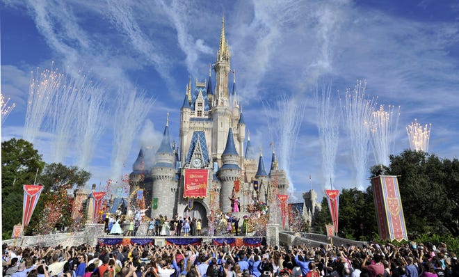 Fireworks punctuate the sky at the grand opening celebration at the Cinderella Castle for the Fantasyland attraction at the Walt Disney World Resort's Magic Kingdom theme park in 2012. Orlando is the “Theme Park Capital of the World” with a 13 parks in the area. [Gene Duncan / Disney World]