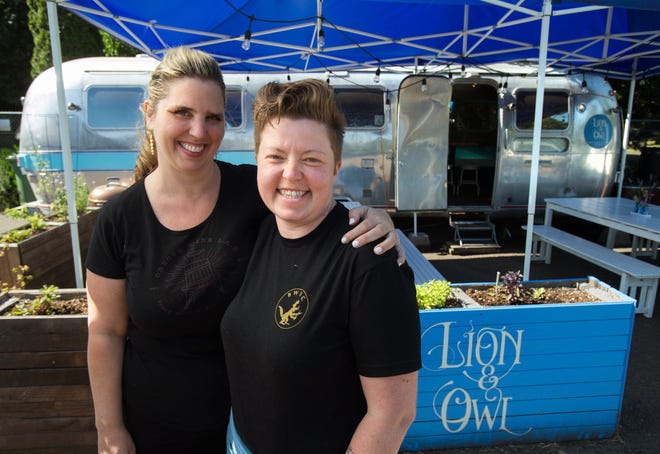 Kirsten Hansen (left) and chef Crystal Platt, co-owners of the Lion & Owl restaurant, are eager to share their culinary talents from their Airstream trailer in Eugene. [Brian Davies/The Register-Guard] - registerguard.com