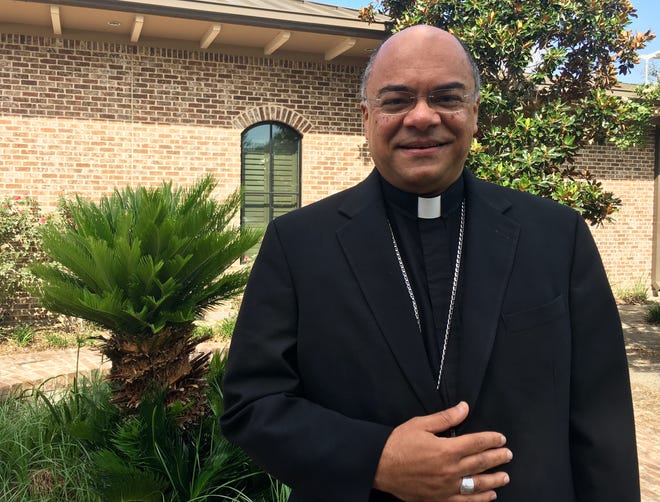 Bishop Shelton J. Fabre poses outside the Houma-Thibodaux diocese's offices in Schriever. [Andrea Mujica/Staff Writer--houmatoday/dailycomet]
