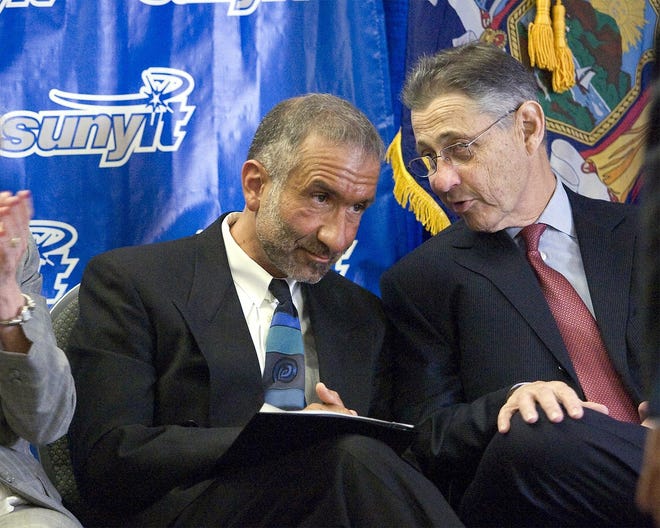 Alain Kaloyeros, left, then-vice president and chief administrative officer of the College of Nanoscale Science and Engineering at the University at Albany, left, listens to then-state Assembly Speaker Sheldon Silver during a 2009 news conference hyping nanotechnology development at the SUNY Marcy campus. Both men have since been convicted on corruption charges. [OBSERVER-DISPATCH FILE PHOTO]