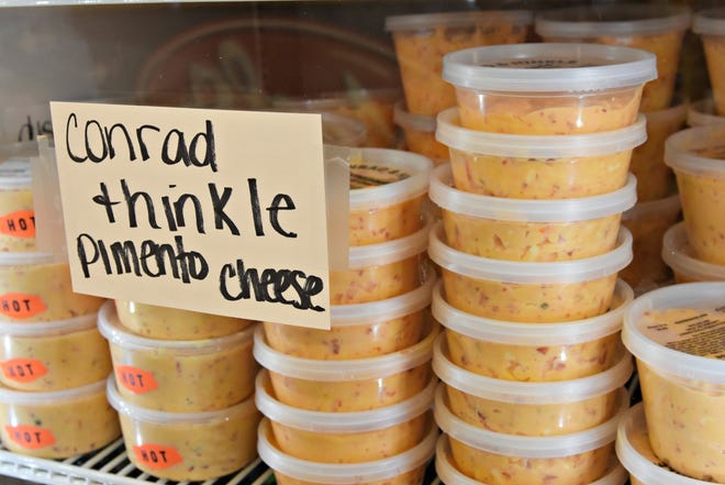 Foodies can buy two kinds of homemade pimento cheese from Eagle Island Fruit and Seafood, inlcuding Conrad & Hinkle made in Lexington, North Carolina. [ASHLEY MORRIS/STARNEWS]