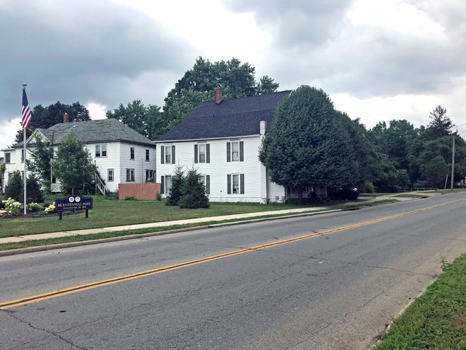 The two homes east of Bicentennial Park, two of the 13 properties, the city plans to purchase along Center Run Creek in order to restore the riparian corridor between the Dairy Queen and Miller Street.