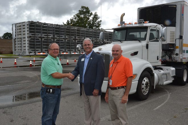 Pictured left to right are Tommy Robertson, division manager, Sanderson Farms of Kinston, Dr. Rusty Hunt, president, Lenoir Community College, and Ken Rhodes, occupational extension coordinator, Lenoir Community College. [Submited photo]