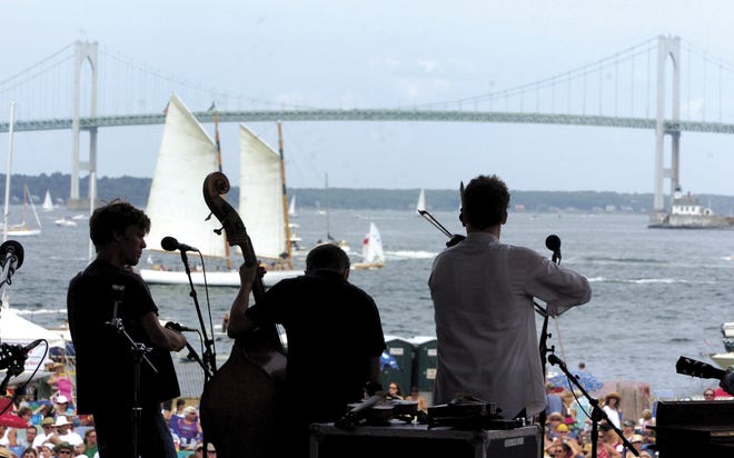 Old Crow Medicine Show have the best seat in the house, overlooking the harbor with a view of the Pell Bridge, while performing in 2005. [DAILY NEWS ARCHIVES]