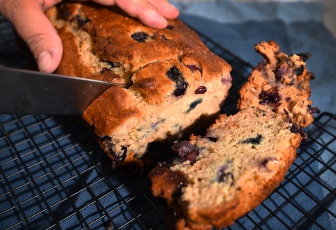 Save some blueberries to put on top of the Blueberry Oatmeal Quick Bread batter. [Jack Hanrahan/Erie Times-News]
