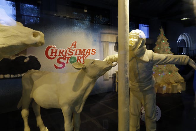 The Butter Cow and scenes from the classic film "A Christmas Story" were revealed during a press conference at the Dairy Products Building at the Ohio State fair Tuesday. (Kyle Robertson/Dispatch)