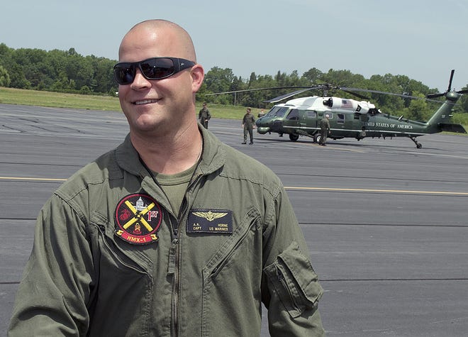 Pilot Adam Horne arrives at the Davidson County Airport on a stop-over for refueling the U.S. Marines HXM-1 presidential helicopter in 2015. [Donnie Roberts/The Dispatch ]