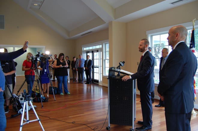 Brunswick County District Attorney Jon David speaks Thursday during a press conference announcing the arrest of Southport's two top police officials. [CAMMIE BELLAMY/STARNEWS]