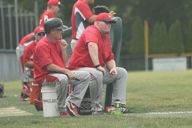 Monmouth Legion coaches Shawn Temple and Ross Parcel watch the action recently during a game. Parcel just completed his first year as the head coach of Post 136.  JULIE HOPSON/REVIEW ATLAS