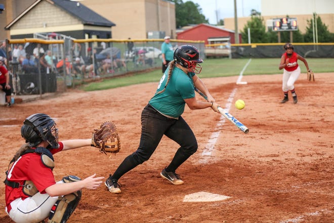 South Gaston Legion softball player Sierra Ghorley (8) hits a pitch during a 6-5, 8-inning win over the Gaston Braves at North Gaston High School on Tuesday. [Bill Bostick/Special to The Gaston Gazette]