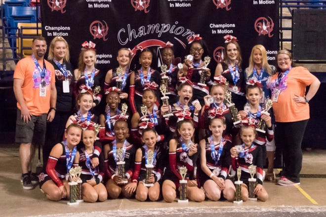 New Bern's Champions in Motion Level 5 cheer team won a state competition in Fayetteville on June 3. The team not only became state champs, but also scored enough points to win an automatic bid to Nationals in Orlando, Fla. in July 2019. The team of 19 girls range in age from 8 to 15 and are led by head coach Michelle Brown. The team will be competing at Nationals against 12 states in hopes to bring back that national title to New Bern. To afford the costly trip to Nationals the team will participate in several fundraisers. Sponsors will be needed to help offset costs of the trip and entry fees for the national competition. Pictured, bottom row, are Riley Dixon, Taylor Shaffer, Syndee Hayes, Addison Brinson, Parker Taylor, Alyssa Merchel, and Emma Toler. Pictured middle row are Emily Campbell, Shalawn Yates, Tyasjah Gaylor, Aliyah Jones, Madison Bush, and Bella Brown. Pictured top row are Jason Persilver, Caitlyn McCaffity, Cammey Merchant, Marissa Hinshaw, Alanna Smith-Boston, Alissa Yates, Jaynia Broy, Challie Golden, Michelle Brown, and Misty Persilver. [CONTRIBUTED PHOTO]