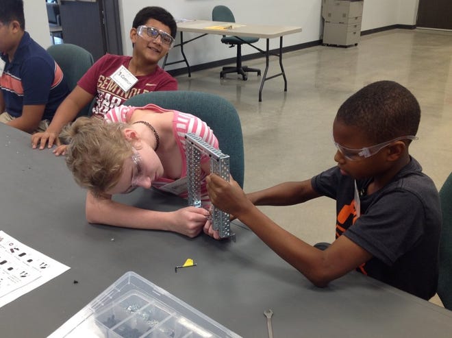 Students collaborate on a project during a recent STEM camp at Lake Technical College. [Submitted]