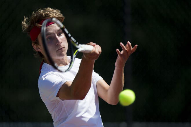 Silas Setterstrom returns a forehand against Ed Schradermeier in a semifinal singles match Saturday, July 1, 2017, during the Freeport City Tennis Tournament at Read Park. [THE JOURNAL-STANDARD FILE PHOTO]