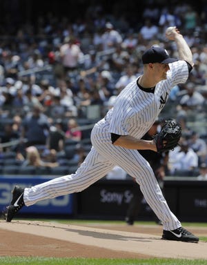 The Yankees' J.A. Happ delivers during the first inning of Sunday's game against the Kansas City Royals in New York. Happ, a former member of the Philadelphia Phillies, gave up one run in six innings to win is Yankees debut. [FRANK FRANKLIN II / THE ASSOCIATED PRESS]
