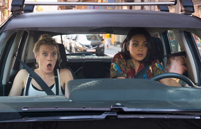 Morgan and Audrey (Kate McKinnon and Mila Kunis) probably should have hired a Lyft. [Lionsgate]