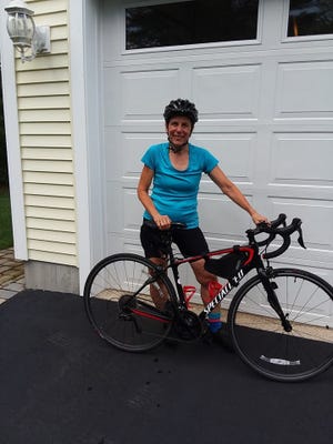 Bonnie Wheeler with her bike. [Courtesy Photo]