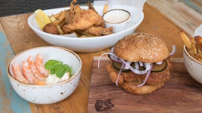 Can crop out shrimp dish
      Sunchokes give the bun on the fried chicken sandwich at Fixe a unique flavor.
      Contributed by Fixe
