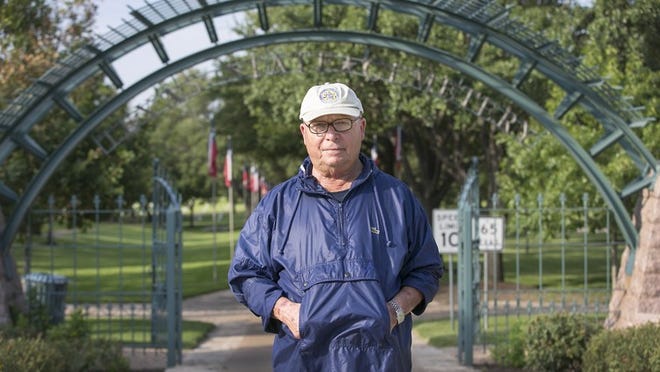 After 23 years on the job, Harry Bradley was fired as superintendent of the Texas State Cemetery and escorted off the grounds. He visited the north entrance to the historic place Wednesday morning. Bradley is approved for burial in the cemetery’s Republic Hill. RALPH BARRERA / AMERICAN-STATESMAN