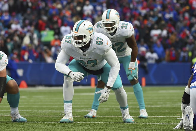 Miami offensive tackle Laremy Tunsil (67) says he's ready to live up to expectations this season. [Rich Barnes/The Associated Press]