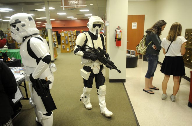 A Star Wars stormtrooper patrols the library during the 3rd annual Fandom Fest in Westampton in 2017. [ARCHIVE PHOTO]
