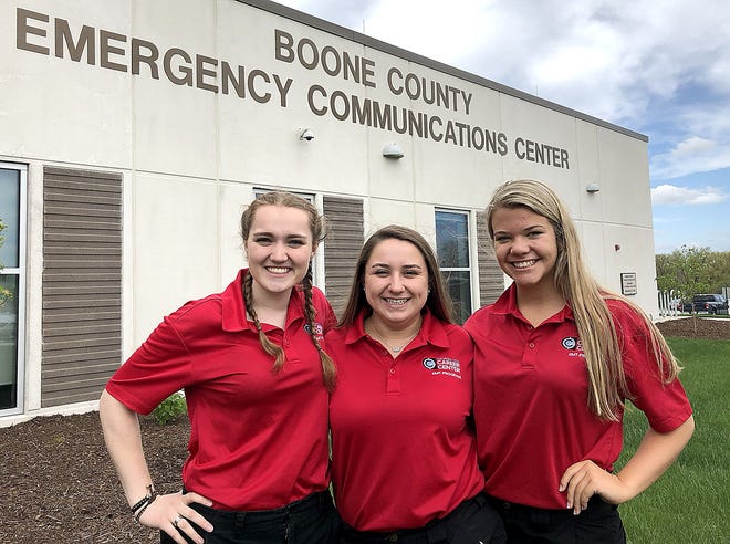 Three Columbia Area Career Center students won a second place award and silver medals at the SkillsUSA 2018 National Leadership and Skills Conference for their project to help elementary students to learn about calling 911. The motto is "you're never to small to make the call." From left, Tess Brinkerhoff, Morgan DeVault and Jenny Allen. [Submitted]
