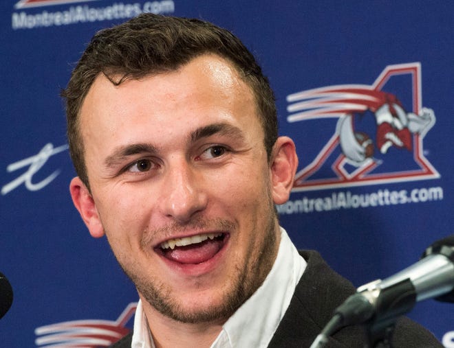 FILE - In this July 23, 2018, file photo, Montreal Alouettes quarterback Johnny Manziel speaks to the media after practice in Montreal. The Alouettes announced that Manziel will be their starter Friday night, Aug. 3, 2018, when they host the Hamilton Tiger-Cats. The 2012 Heisman Trophy winner began the season with Hamilton and was dealt to Montreal on July 22 in a five-player deal that also included two first-round draft picks.(Ryan Remiorz/The Canadian Press via AP, File)
