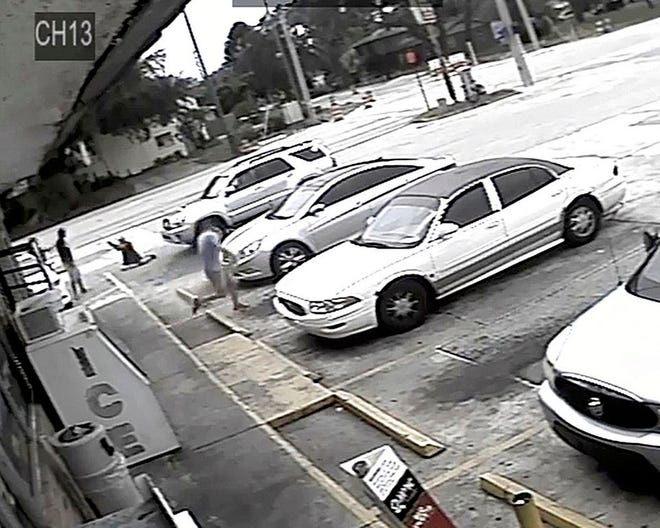 In this July 19, 2018 file frame from surveillance video released by the Pinellas County Sheriff's Office, Markeis McGlockton, far left, is shot by Michael Drejka during an altercation in the parking lot of a convenience store in Clearwater, Fla. A Florida sheriff said the case is still under investigation and will be sent to the state attorney. Pinellas County Sheriff Bob Gualtieri acknowledged during a Tuesday, July 31, news conference that the shooting death of McGlockton has grabbed national attention and intensified the debate about Florida's "stand your ground" law. [ PINELLAS COUNTY SHERIFF'S OFFICE / AP ]