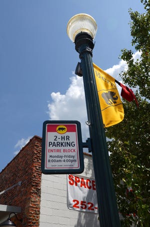 A new parking plan for downtown New Bern went into effect July 9. The plan, features enforced two-hour on-street parking and adds three additional free parking lots. [TODD WETHERINGTON / SUN JOURNAL STAFF]