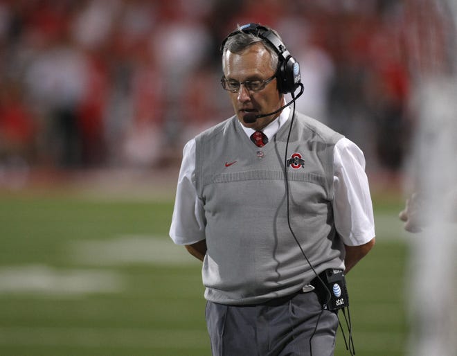 Former Ohio State head coach Jim Tressel during the third quarter of the NCAA football game at Ohio Stadium. [Photo by Jonathan Quilter]