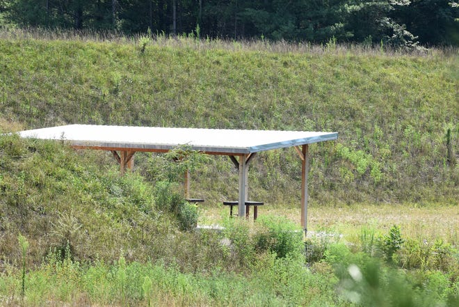One of the shooting range shelters Bruce Odle has built which uses earthen berms on three sides for shooting safety. [Don Shrubshell/Tribune]