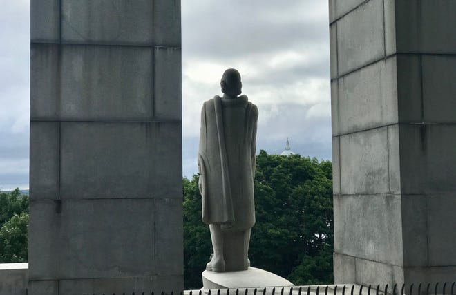 A statue representing Roger Williams (there is no historical description of his appearance) looks out over Providence, R.I., the city he founded as a refuge from religious persecution. [Photo by Rick Holmes]