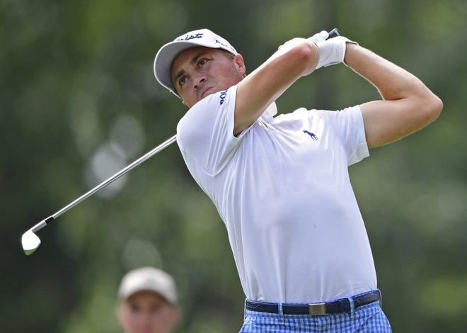 Justin Thomas watches his tee shot on the 15th hole during the second round of the Bridgestone Invitational golf tournament at Firestone Country Club on Friday in Akron, Ohio. [AP Photo/David Dermer]