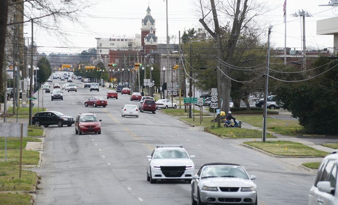 Vehicles travel along Queen Street near Vernon Avenue on Friday. 

According to the city, the design work for Queen Street is nearing completion and construction could begin later this year or early next year. Photo by Janet S. Carter / The Free Press