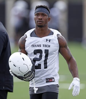 Texas Tech opened preseason practice Friday, and sophomore running back Da'Leon Ward was back in the picture with the Red Raiders. The team's 2016 rushing leader missed last season to focus on academics. [Brad Tollefson/A-J Media]