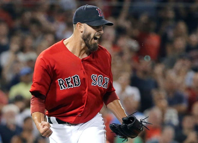 Rick Porcello celebrates after the final out in Friday night's one-hitter against the Yankees.